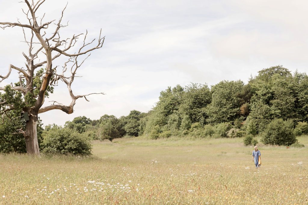 lady walking in field