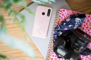 Image showing laptop, phone, DSLR camera and diary